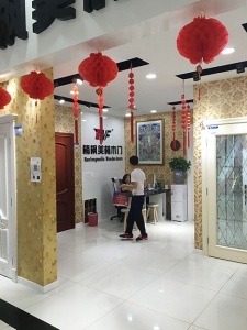 中國木門十大品牌走進(jìn)城外城